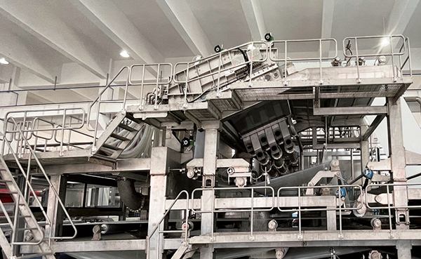 Wet forming system of nonwoven fabric