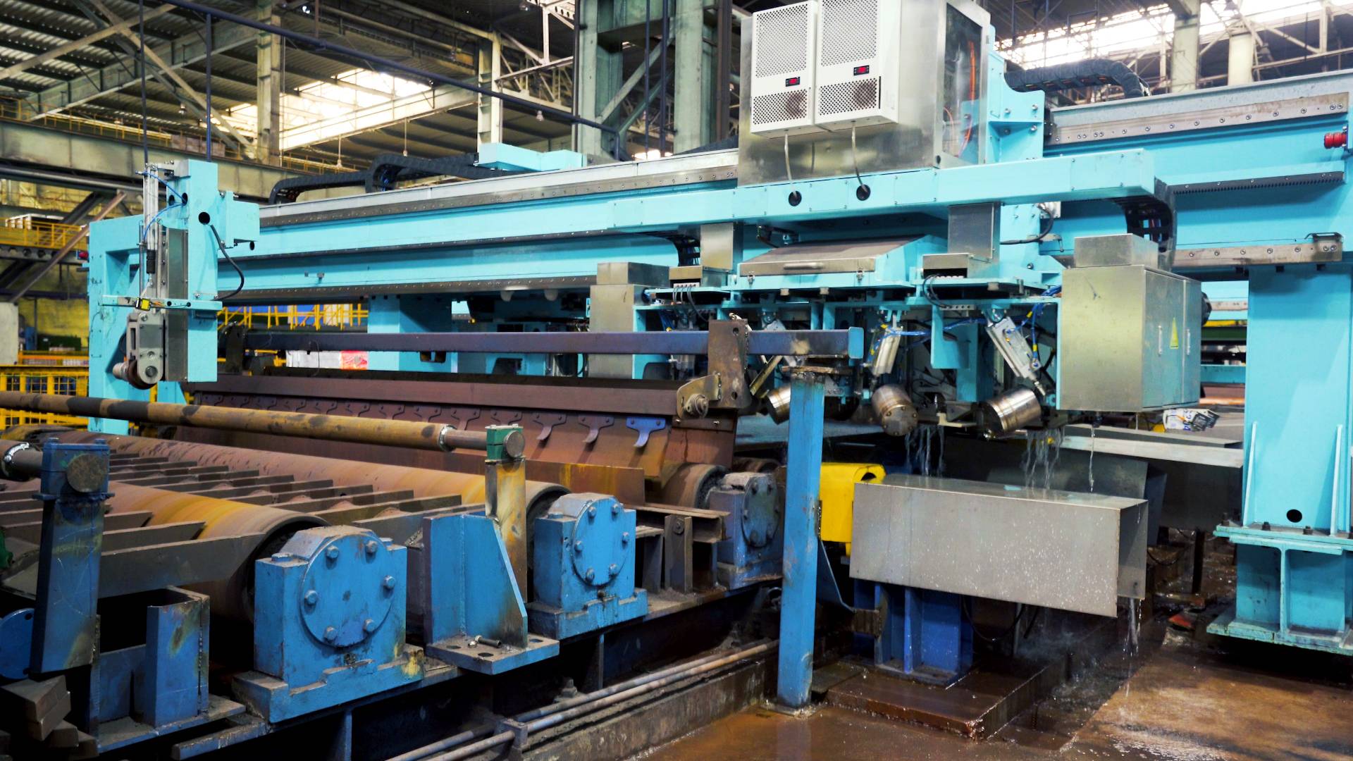 Automatic Phased Array Ultrasonic Flaw Detection System for Steel Plates